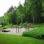 Mavebøjning Bænk placeret i naturlig park setting