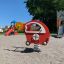 Rød og gul Vippedyr – Copter på en legeplads