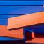 Detaljeret visning af Legepanel – Racerbane med blå og orange banestykker.