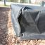 Sort Sandkasseoverdækning 2m x 2m på legepladsen.