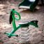 Grøn Flamingoen vippehest på fjeder til legepladser.