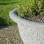 Beton Blomsterkumme Bell med planter i moderne haveindretning