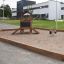 Legepladsudstyr Hønsehuset Natur i sandkasse på skolegård.